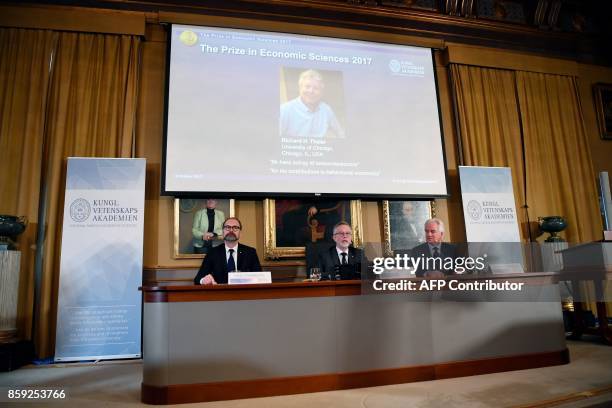 Chairman of the comittee for the Nobel Economics Prize Per Stromberg, Secretary General of the Royal Swedish Academy of Sciences Goran Hansson and...