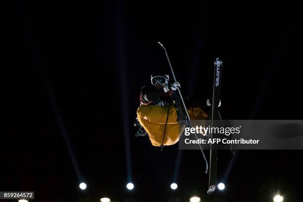 French Freestyle skier Antoine Adelisse jumps as he performs in the Sosh Big Air, a competition of freestyle skiers and snowboarders, in Annecy, on...