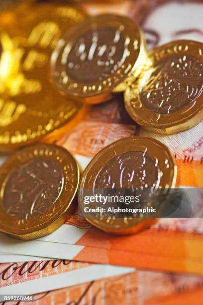 new pound coin released 2017 - balance finance minimal stock pictures, royalty-free photos & images