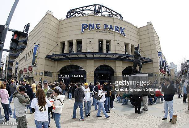 Fans mill around outside the ballpark on opening day for the Pittsburgh Pirates prior to playing the Houston Astros at PNC Park April 13, 2009 in...