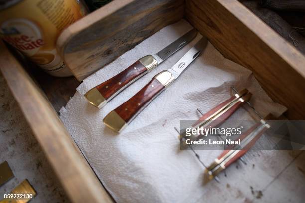 Hand-made knives by traditional cutler Michael May are seen in his studio, where he makes pen, pocket and bowie knives, on November 8, 2016 in...