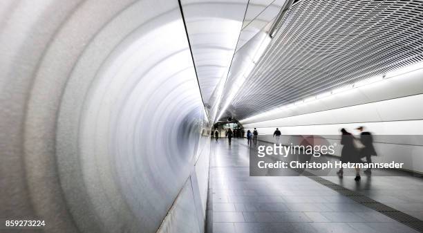 underpass - symmetry people stock pictures, royalty-free photos & images