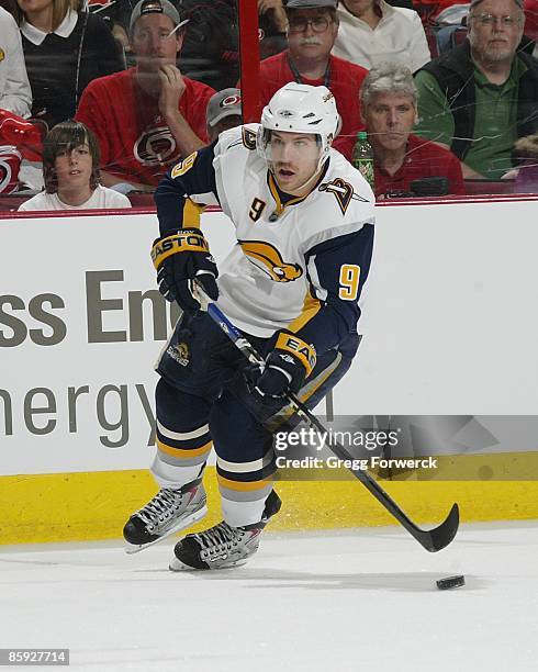 Derek Roy of the Buffalo Sabres carries the puck during a NHL game against the Carolina Hurricanes on April 9, 2009 at RBC Center in Raleigh, North...