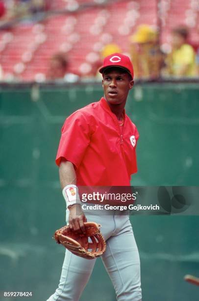 Eric Davis of the Cincinnati Reds walks off the field after batting practice before a Major League Baseball game against the Pittsburgh Pirates at...