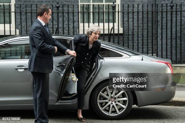Britain's Prime Minister, Theresa May, arrives in Downing Street on October 9, 2017 in London, England. Prime Minister Theresa May will tell...