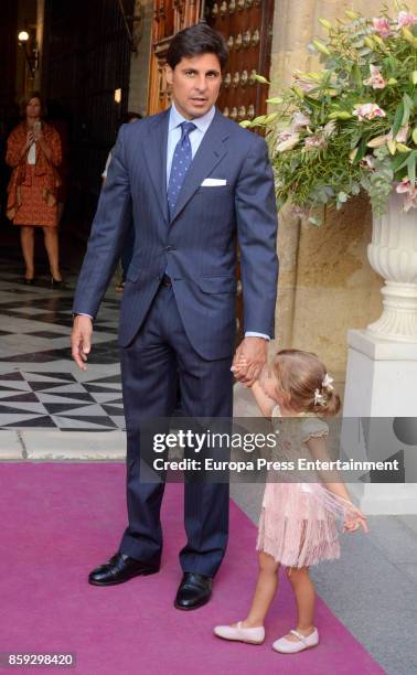 Francisco Rivera and his daughter Carmen Rivera Montes attend Sibi Montes and Alvaro Sanchis's wedding at Parroquia Santa Ana on October 7, 2017 in...