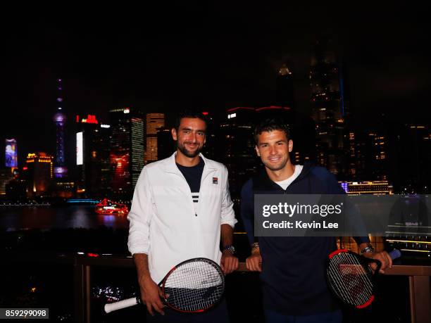 Marin Cilic and Grigor Dimitrov pose for a picture at Fosun Foundation at the Bund on Day 2 of 2017 ATP 1000 Shanghai Rolex Masters on October 9,...