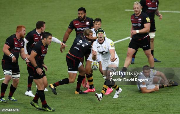 James Gaskell of Wasps passes the ball during the Aviva Premiership match between Saracens and Wasps at Allianz Park on October 8, 2017 in Barnet,...