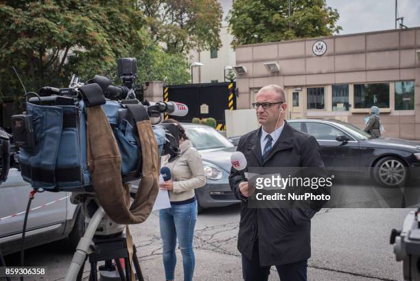 Turkish TV news crews broadcast in front of the United States Embassy in Ankara, Turkey, on Monday, 9 October 2017. American visa services were...