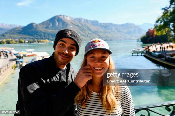 French freestyle skier and 2017 slopestyle world champion, Tess Ledeux poses with her cousin, French freestyle half-pipe skier Kevin Rolland during...