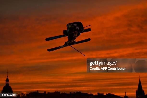 Switzerland's freestyle skier, Fabian Boesch performs a jump during the Sosh Big Air festival in Annecy on October 7, 2017. / AFP PHOTO / CHRISTOPHE...