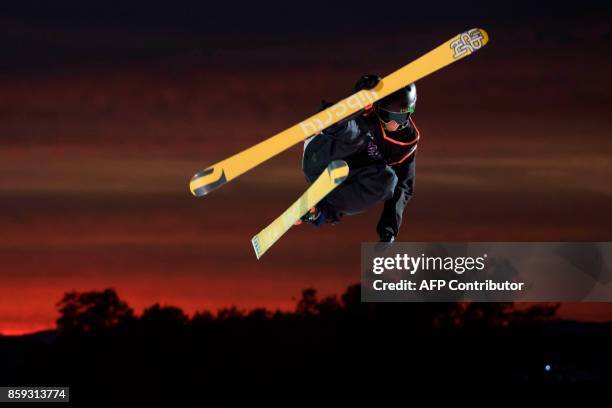 Canada's freestyle skier, Teal Harle performs a jump during the Sosh Big Air festival in Annecy on October 7, 2017. / AFP PHOTO / CHRISTOPHE SIMON