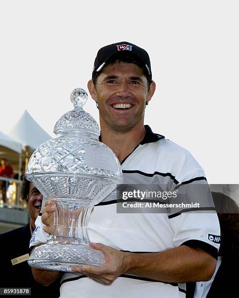 Padraig Harrington holds the winner's trophy after final round competition at the 2005 Honda Classic March 13, 2005 in Palm Beach Gardens, Florida....