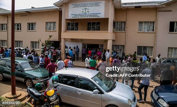 Courts In Rwanda People gather at the entrance of the Nyarugenge Intermediate Court in ...
