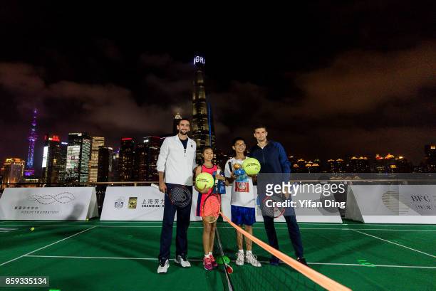 Marin Cilic of Croatia and Grigor Dimitrov of Bulgaria pose for a picture on day 2 of ATP 1000 Shanghai Rolex Masters 2017 at Fosun Foundation on...