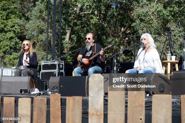 Singers Patty Griffin, Steve Earle and Emmylou Harris perform onstage as part of the Lampedusa: Concert for Refugees during Hardly Strictly Bluegrass...