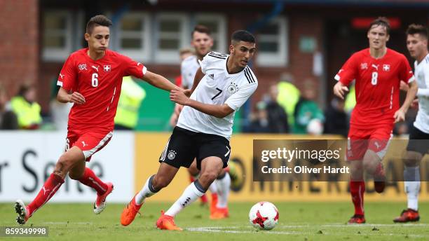 Aymen Barkok of Germany and Eris Abedini of Switzerland compete for the ball during the international friendly U20 match between U20 Germany and U20...