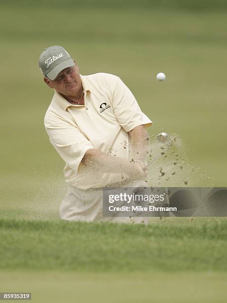 Larry Ziegler chips out of the bunker on the 18th hole during the first round of the 2005 Allianz Championship at the Tournament Club of Iowa in Polk...