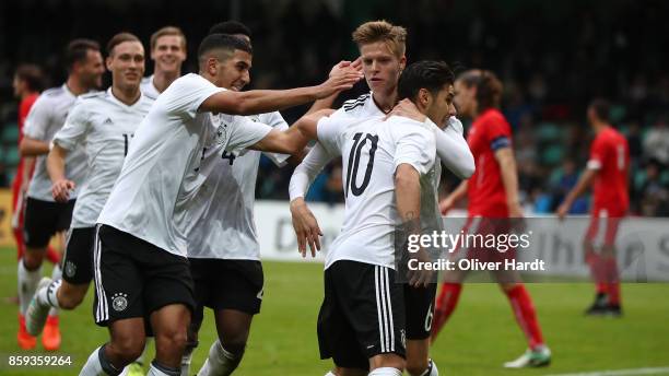 Goerkem Saglam of Germany celebrates with teammates after his first goal during the international friendly U20 match between U20 Germany and U20...