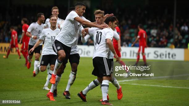 Goerkem Saglam of Germany celebrates with teammates after his first goal during the international friendly U20 match between U20 Germany and U20...