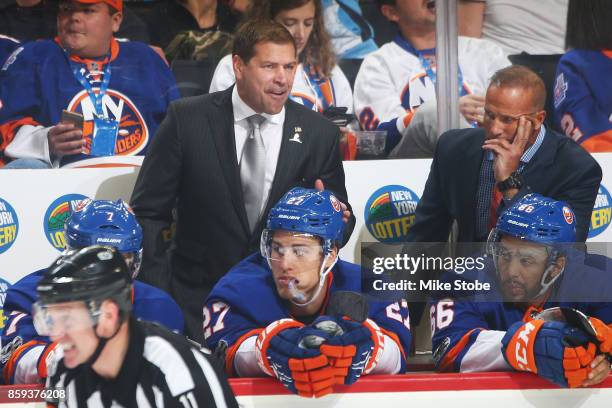 Head coach of the New York Islanders Doug Weight looks on from the bench during the game against the Buffalo Sabres at Barclays Center on October 7,...