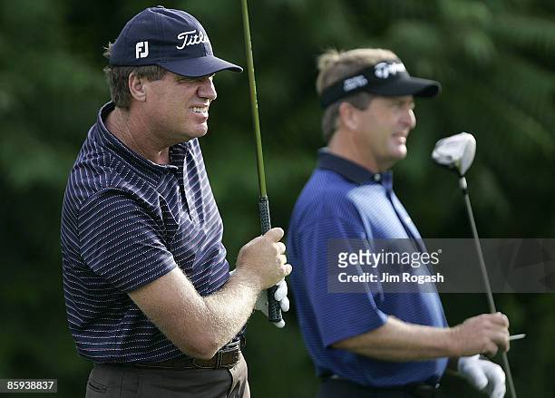 Steve Elkington, left and Fred Funk in action during the second round of the Buick Championship at Tournament Player Club at River Highlands, in...