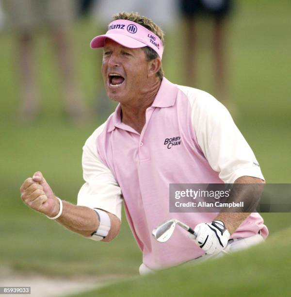 Dana Quigley reacts to his sand shot on 18 on the first of two playoff holes, during the final round of the 2005 JELD-WEN Tradition at The Reserve...