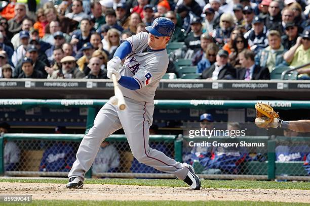 Hank Blalock of the Texas Rangers swings at the pitch against the Detroit Tigers during Opening Day on April 10, 2009 at Comerica Park in Detroit,...