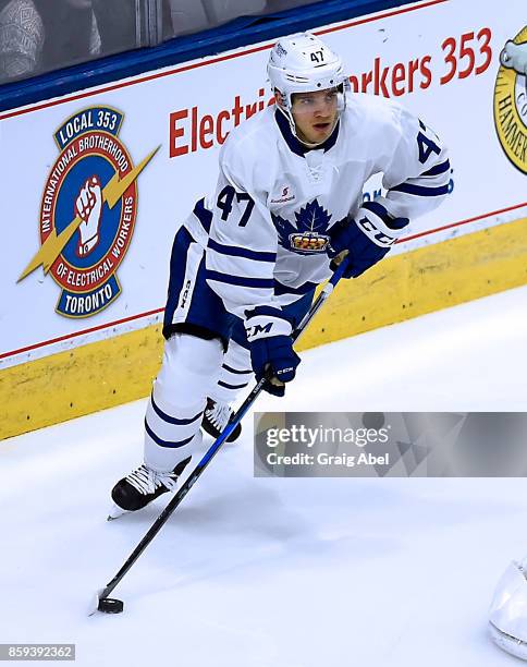 Timothy Liljegren of the Toronto Marlies turns up ice against the Utica Comets during AHL game action on October 7, 2017 at Ricoh Coliseum in...