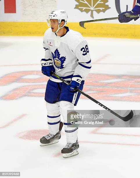 Colin Greening of the Toronto Marlies watches the play develop against the Utica Comets during AHL game action on October 7, 2017 at Ricoh Coliseum...