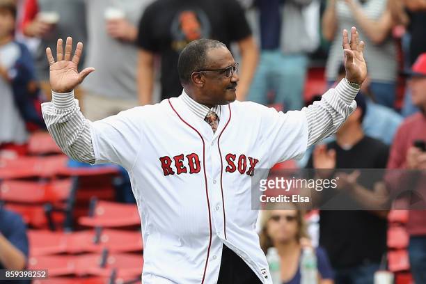 Former Boston Red Sox player Jim Rice acknowledges the crowd before throwing out the ceremonial first pitch before game four of the American League...