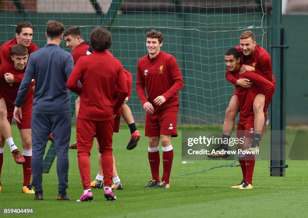 Yan Dhanda and Herbie Kane of Liverpool during a training session at Melwood Training Ground on October 9, 2017 in Liverpool, England.