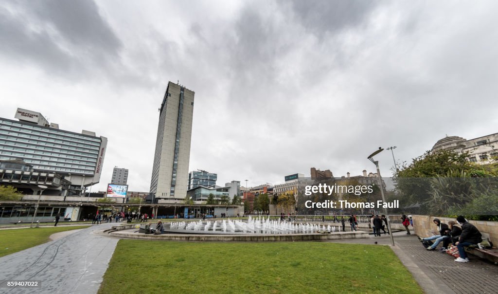 Fountains and shops in Piccadilly Gardens, Manchester