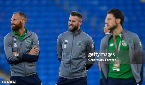 David Meyler of the Republic of Ireland speaks to Daryl Murphy of the Republic of Ireland on the pitch prior to the FIFA 2018 World Cup Group D...