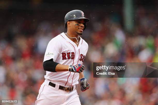 Xander Bogaerts of the Boston Red Sox runs the bases after hitting a solo home run in the first inning against the Houston Astros during game four of...