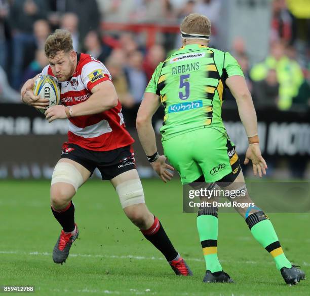 Tom Savage of Gloucester runs with the ball during the Aviva Premiership match between Gloucester Rugby and Northampton Saints at Kingsholm Stadium...