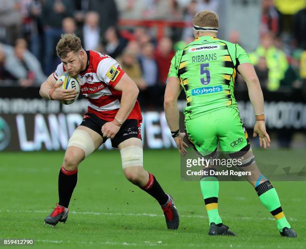 Tom Savage of Gloucester runs with the ball during the Aviva Premiership match between Gloucester Rugby and Northampton Saints at Kingsholm Stadium...