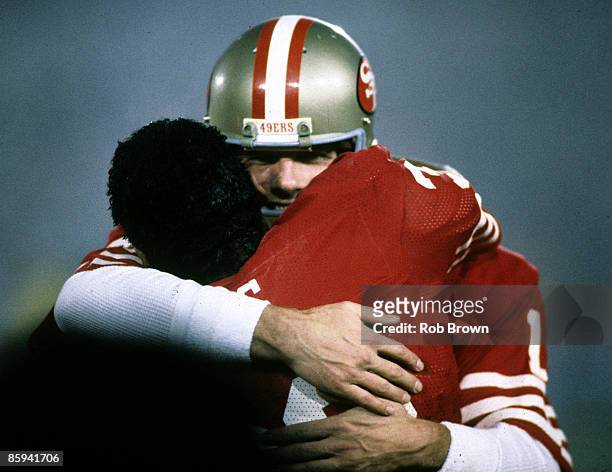 San Francisco 49ers Hall of Fame quarterback Joe Montana hugs running back Roger Craig late in Super Bowl XIX, a 38-16 victory over the Miami...