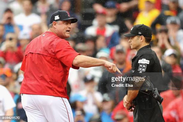 Manager John Farrell of the Boston Red Sox argues a call in the second inning and is ejected during game four of the American League Division Series...
