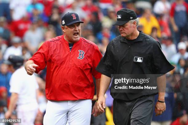 Manager John Farrell of the Boston Red Sox argues a call in the second inning and is ejected during game four of the American League Division Series...