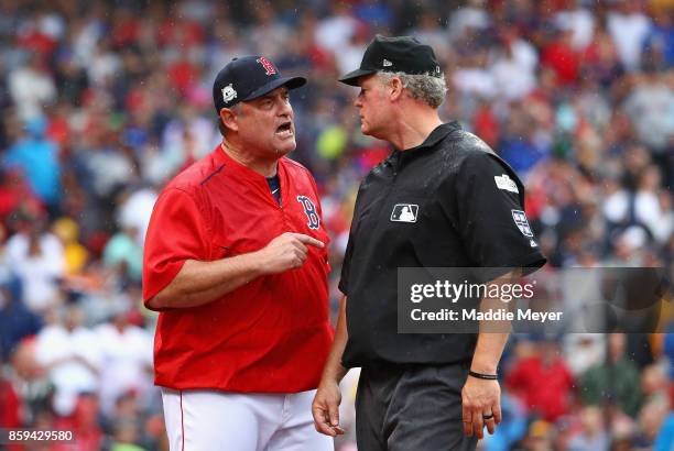 Manager John Farrell of the Boston Red Sox argues a call in the second inning and is ejected during game four of the American League Division Series...