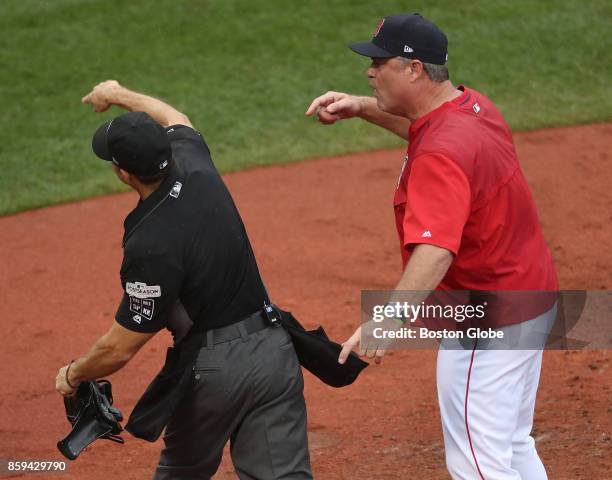 Boston Red Sox manager John Farrell gets ejected by home plate umpire Mark Wegner in the second inning. The Boston Red Sox host the Houston Astros in...