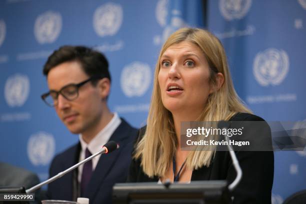 Asia-Pacific Director Tim Wright, left, looks on as ICAN Executive Director Beatrice Fihn addresses media during a press conference by the...