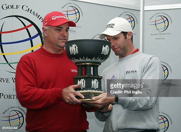 Stephen Dodd and Bradley Dredge of Wales with the John Hopkins trophy after winning the 2005 Algarve World Cup at the Victoria Golf Club in...