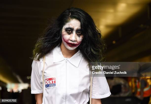 Comic Con cosplayer dressed as The Joker poses during the 2017 New York Comic Con - Day 4 on October 8, 2017 in New York City.
