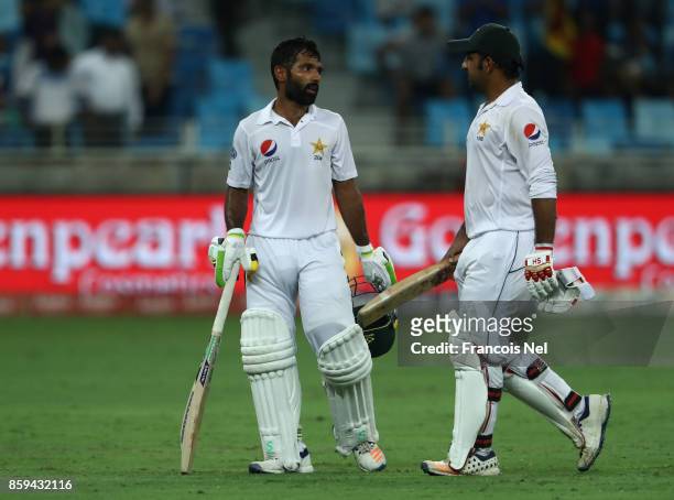 Sarfraz Ahmed and Asad Shafiq of Pakistan leave the field at the close of play during Day Four of the Second Test between Pakistan and Sri Lanka at...