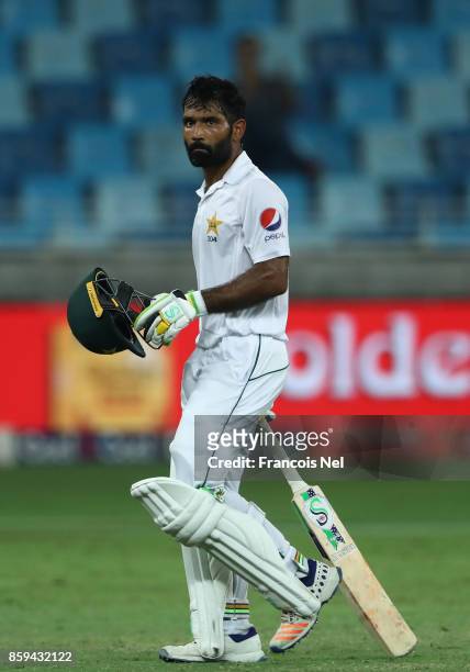 Asad Shafiq of Pakistan leave the field at the close of play leave the field at the close of play during Day Four of the Second Test between Pakistan...