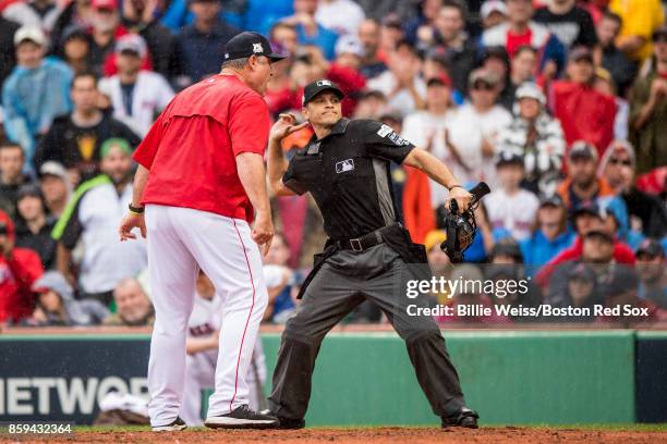Manager John Farrell of the Boston Red Sox is ejected from the game after arguing with home plate umpire Mark Wegner during the second inning of game...