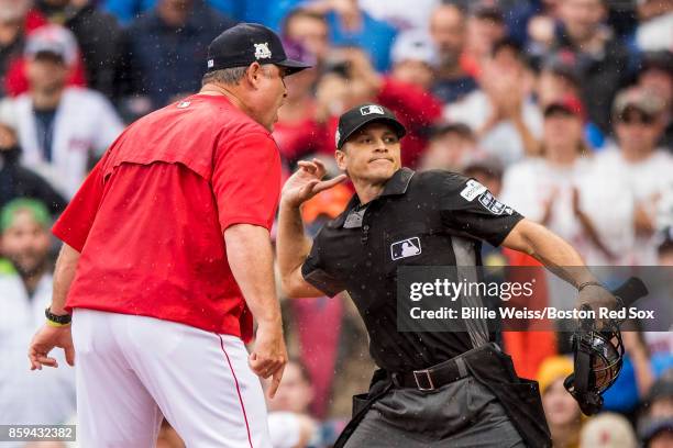 Manager John Farrell of the Boston Red Sox is ejected from the game after arguing with home plate umpire Mark Wegner during the second inning of game...