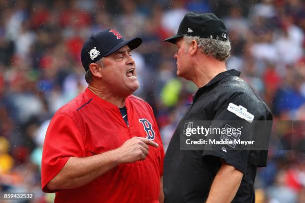 Manager John Farrell of the Boston Red Sox argues a call in the second inning and is ejected from game four of the American League Division Series...